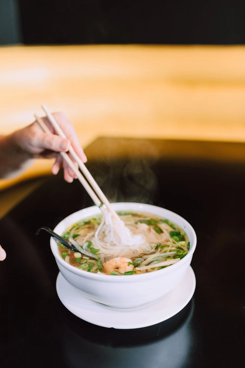 chinese soup with rice noodles and parsley